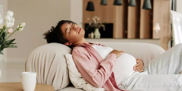 Pregnant woman lying down resting